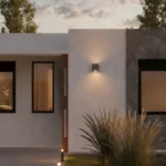 Render de fachada de vivienda unifamiliar iluminada al anochecer – proyecto residencial